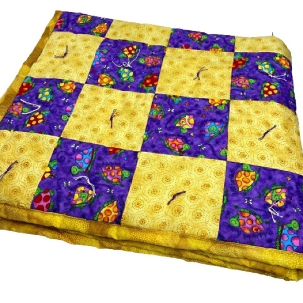 Handmade NWT turtle themed purple and gold baby or lap quilt size 43” X 38”